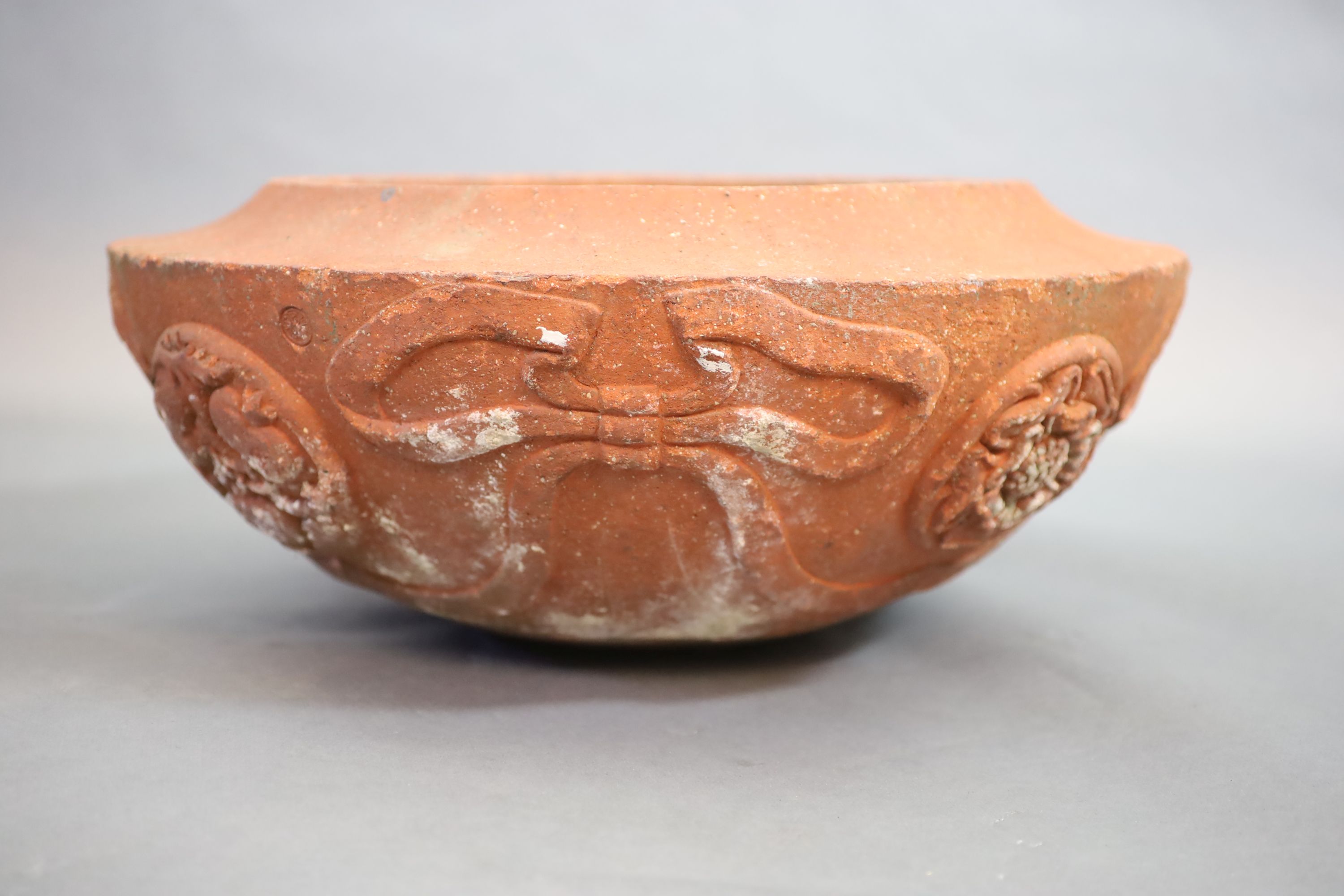 A Compton pottery ‘seasons’ terracotta planter, early 20th century, height 18cm 55cm diameter